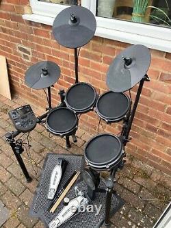 Alesis Nitro Mesh Electronic Drum Kit comes with Drum Sticks and Stool