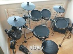 Alesis Surge Mesh Drumkit Eight-Piece Electronic Drum Kit with Mesh Heads