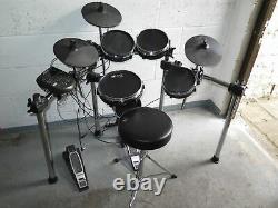 Alesis Surge electronic drum kit with mesh heads and throne / WORKS WELL READ