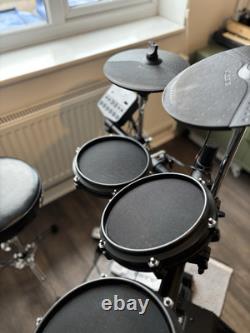 Alesis Turbo Mesh Electronic Drum Kit with Sub Zero drum amp and Sonor stool
