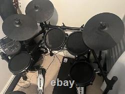 Alesis nitro mesh drum kit with stall