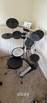 All-in-one electronic Roland Drum Kit. Great for beginners