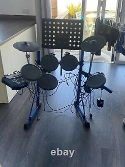 Roland Electronic Drum Kit with stool, pedal and amp