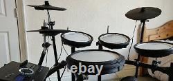 Roland TD17-KV electronic drum kit and Tama drum stool