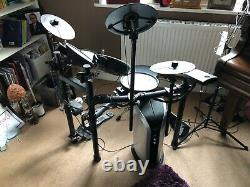 Roland TD-1DMK electronic drum kit, with PM-03 Amp, Stool and headphones