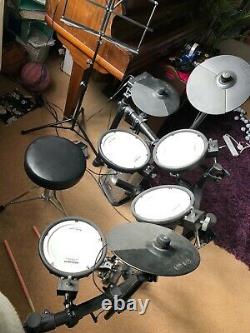 Roland TD-1DMK electronic drum kit, with PM-03 Amp, Stool and headphones