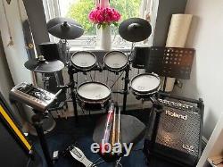Roland td 9 electric drum kit with extras, speaker system and dvds