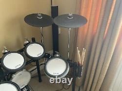 Yamaha dtx 582 K electronic drumkit. Stool and Roland drum amp pm30